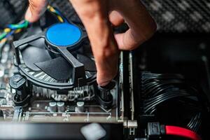 Installing CPU Cooler on Motherboard photo