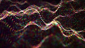 Abstract stream of colorful dots in a shape of elegant waves with glow effect on a dark background. Energy flow visualization for science, new technology, neural network and art performance. 4k 60 fps video