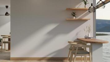 A modern, minimal cafe or restaurant with a minimal dining table near the large glass window. photo