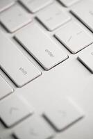 Computer keyboard and on the desk close up. photo