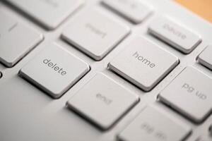 Computer keyboard and on the desk close up. photo