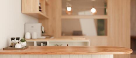 Copy space on a wooden kitchen countertop in a minimalist Scandinavian kitchen. photo