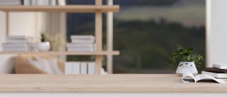Minimal wooden table with a copy space with a blurred background of a modern, minimalist living room photo