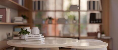 Copy space on a table in a modern, cosy room with bookshelf. reading room, office room, bookstore. photo