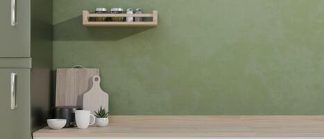 A space for displaying your product on a hardwood kitchen countertop against the green wall. photo