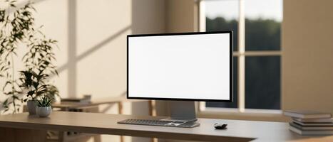 A computer with a white-screen mockup on a wooden table in a modern, minimalist home office. photo