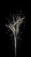 Splashes of water on a black background. photo