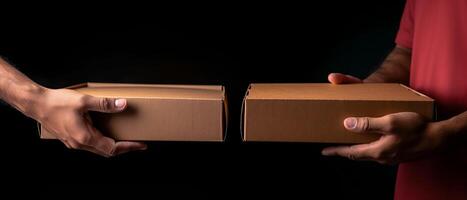 Hands holding a pizza box. Pizza is ready for delivery. . photo