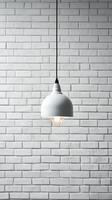 White brick wall with a lamp on the background of stone tiles. . photo