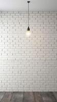 White brick wall with a lamp on the background of stone tiles. . photo