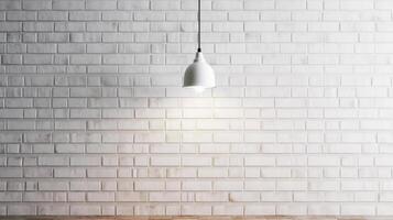 White brick wall with a lamp on the background of stone tiles. . photo