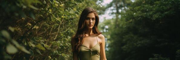 A beautiful girl in a magical forest. . photo