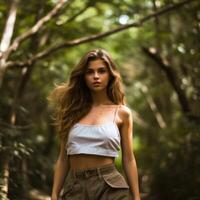 A beautiful girl in a magical forest. . photo