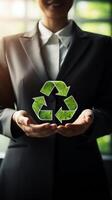 Business person with recycling symbol. . photo