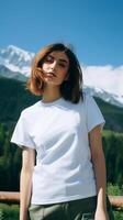 A beautiful girl in a white T-shirt against the background of a beautiful landscape. photo