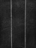 Beautiful Black grunge folded texture. Folded paper background with scratches and dust. Old folded paper texture for your design. photo