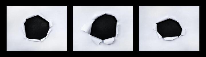 Collections torn paper frame with the ripped sides. a black hole of torn on the white paper. realistic torn paper with the ripped edges for copy space background photo
