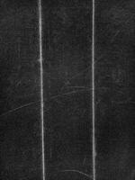 Folded paper with grungy texture in black background. can be used to replicate the aged and worn look for your creative design. old paper for photo texture overlay in retro style