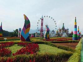 Sumedang, West Java, Indonesia, May 24, 2024. view landscape of a tourist spot called Jatinangor amusement Park, with magnificent and beautiful building with colorful paint photo