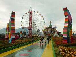 Sumedang, West Java, Indonesia, May 24, 2024. view landscape of a tourist spot called Jatinangor amusement Park, with magnificent and beautiful building with colorful paint photo