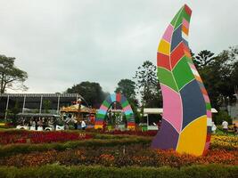 Sumedang, West Java, Indonesia, May 24, 2024. view landscape of a tourist spot called Jatinangor amusement Park, with magnificent and beautiful building with colorful paint photo