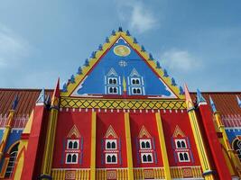 Sumedang, West Java, Indonesia, May 24, 2024. view landscape of a tourist spot called Jatinangor amusement Park, with magnificent and beautiful building with colorful paint photo