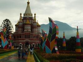 Sumedang, West Java, Indonesia, May 24, 2024. view landscape of a tourist spot called Jatinangor amusement Park, with magnificent and beautiful building with colorful paint photo