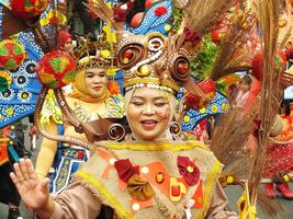 Surakarta City, Central Java, Indonesia, May 15, 2024. Tourist attraction on a traditional costume parade at Slamet Riyadi Street. photo