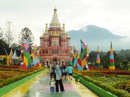 Sumedang, West Java, Indonesia, May 24, 2024. view landscape of a tourist spot called Jatinangor amusement Park, with magnificent and beautiful building with colorful paint photo