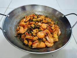 Stir-fry tempeh shrimp, focus of Spicy tempeh cooked in Indonesian styles. Stir fried slicy tempeh,seasoning with shrimp paste with chilies photo