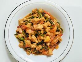 Stir-fry tempeh shrimp, focus of Spicy tempeh cooked in Indonesian styles. Stir fried slicy tempeh,seasoning with shrimp paste with chilies photo