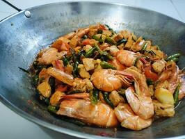 Stir-fry tempeh shrimp, focus of Spicy tempeh cooked in Indonesian styles. Stir fried slicy tempeh,seasoning with shrimp paste with chilies photo