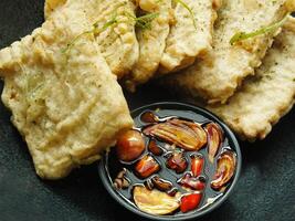 Traditional Indonesian snack, tempe mendoan made from soybeans with savory taste. photo