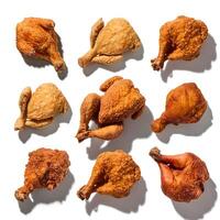 Set of fried chickens isolated on white background, leg piece, full chicken photo