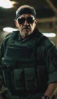 photo of older commander soldier in combat armor outfit on mission scene night ,