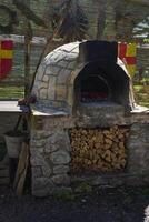 old wood-burning stove to learn about traditional crafts photo