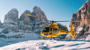 Yellow emergency helicopter in mountains dolomites photo