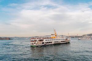 Traffic in the waters of the Bosphorus. Regular traffic of various watercraft from the port in Istanbul. photo