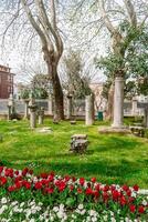 Istanbul, Turkey, April 15, 2023, courtyard of Hagia Sophia in Istanbul. Ancient fragments of the temple in the area near the entrance to Hagia Sophia. photo