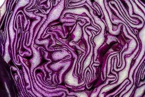 Background slice of red cabbage. Cut red cabbage. photo