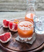 Grapefruit fresh on the wooden table photo