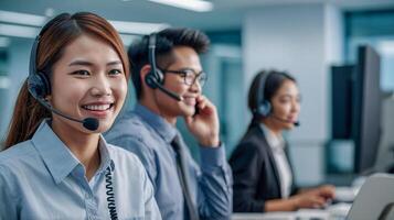 call center worker having fun with his team Smiling customer support employee working to provide customer information over the phone photo