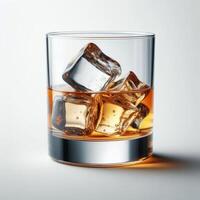 Close-up of whiskey with ice cubes in a clear glass photo