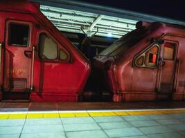 Old red rusty train on the railway station in Sri Lanka, Galle photo