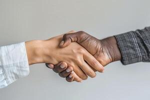 Business handshake, partnership agreement. Successful teamwork in corporate office. Two photo