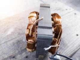 Electric motor winding coil , three phase induction motor winding coil assembly, procedure for replacing.With shiny light. photo