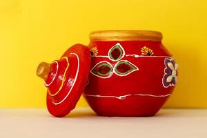 Navratri Festival earthen clay pot. known as Garba is worshipped religiously. also lighting up a diya and place inside the pot. popular festival specially in Gujarat. photo