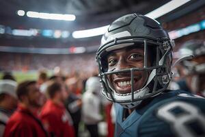 American football players in a black helmet and green uniform are smiling and standing next to fans in the arena. Copy space photo