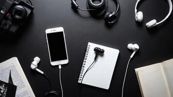 items on black table, background design of random objects on table photo