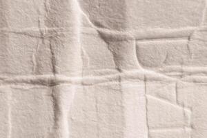 Crumpled White Paper Texture with Detailed Macro Background. photo